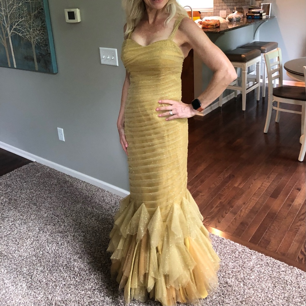 Gold strapless mermaid-style formal gown with a ruffled tulle skirting - Picture 2 of 11